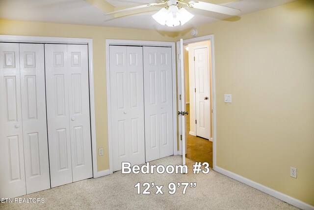 247 Lakeview Dr, Crossville, TN 38558 - unfurnished bedroom featuring multiple closets, baseboards, and a ceiling fan