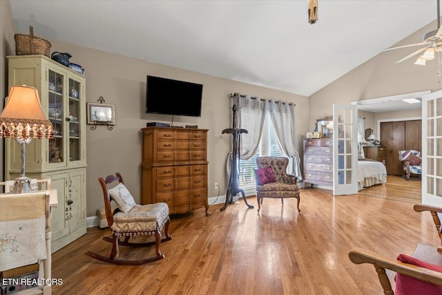 5912 New Beaver Creek Dr, Knoxville, TN 37931 - living area featuring french doors, lofted ceiling, wood finished floors, ceiling fan, and baseboards