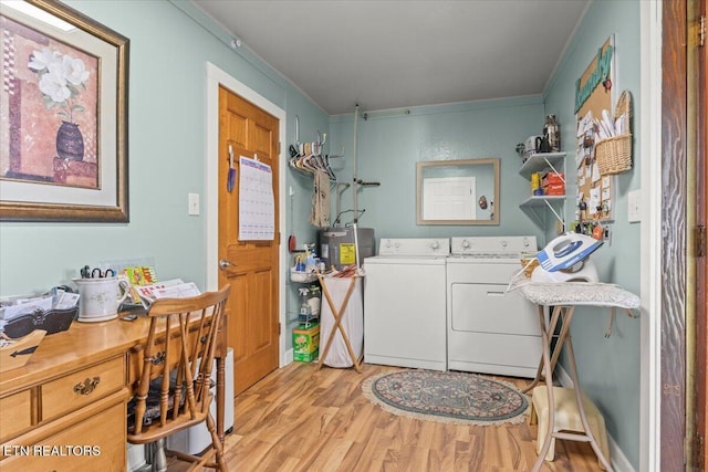 5912 New Beaver Creek Dr, Knoxville, TN 37931 - washroom featuring light wood-style floors, washing machine and dryer, crown molding, and water heater