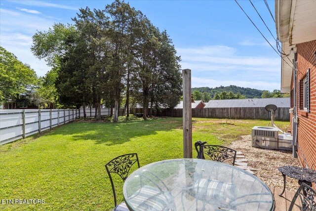 5912 New Beaver Creek Dr, Knoxville, TN 37931 - view of yard with outdoor dining area and central air condition unit