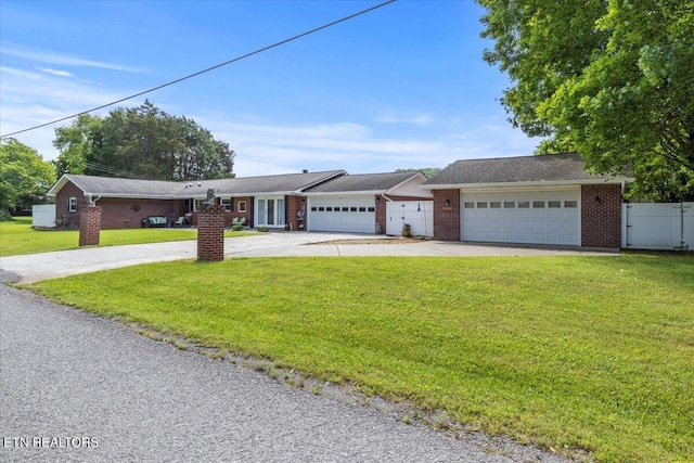 5912 New Beaver Creek Dr, Knoxville, TN 37931 - view of front of home with brick siding, driveway, and an attached garage