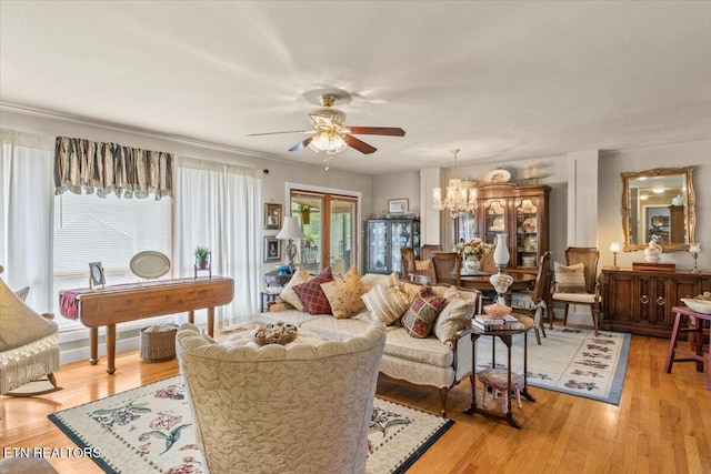 5912 New Beaver Creek Dr, Knoxville, TN 37931 - living area with ceiling fan, light wood-style flooring, and a chandelier