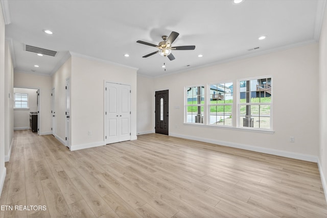 1287 Lori Ellen Ct, Sevierville, TN 37876 - unfurnished living room featuring crown molding, light wood-style flooring, ceiling fan, baseboards, and recessed lighting