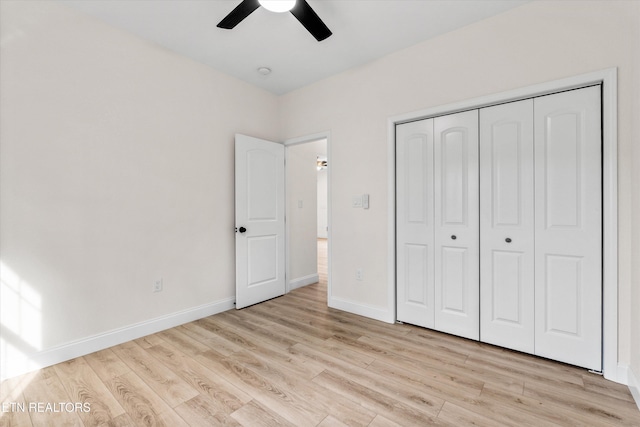 1287 Lori Ellen Ct, Sevierville, TN 37876 - unfurnished bedroom with light wood-style flooring, baseboards, a closet, and ceiling fan