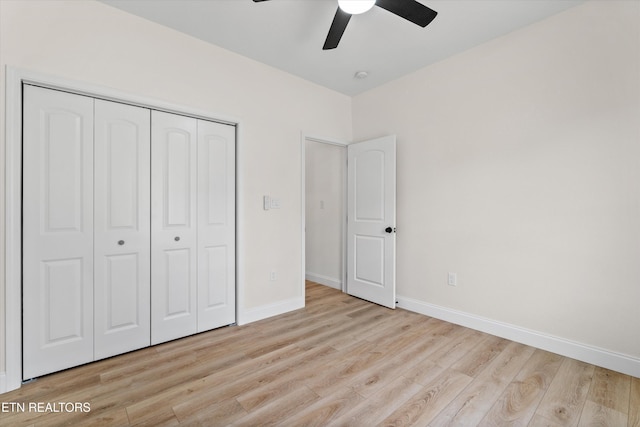1287 Lori Ellen Ct, Sevierville, TN 37876 - unfurnished bedroom with wood finished floors, baseboards, a closet, and a ceiling fan