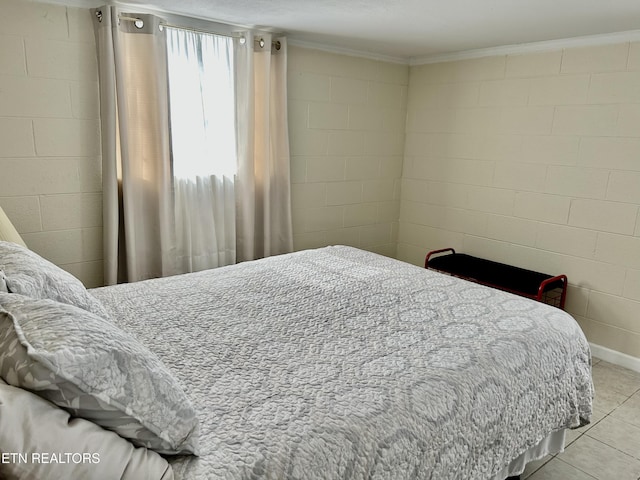 762 Commanche Dr, Jefferson City, TN 37760 - bedroom with light tile patterned floors, ornamental molding, and concrete block wall