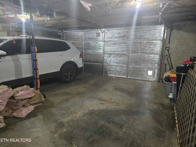 3238 Four M Cir, Kodak, TN 37764 - garage featuring a garage door opener