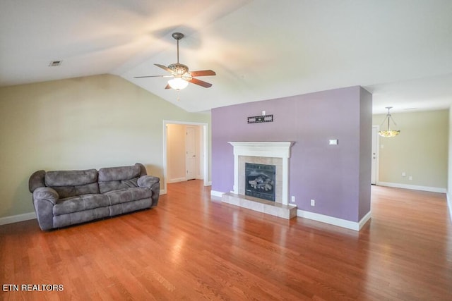 1117 Worthington Blvd, Maryville, TN 37801 - living area featuring a ceiling fan, wood finished floors, a tile fireplace, and lofted ceiling