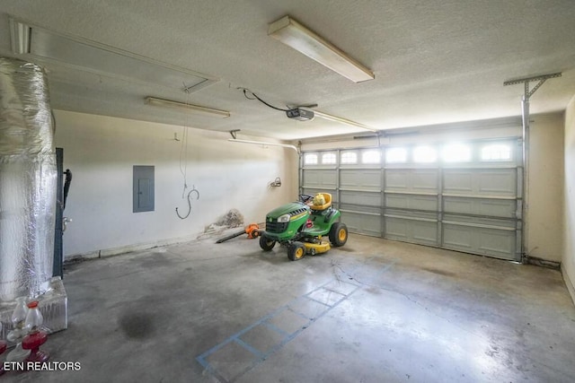1117 Worthington Blvd, Maryville, TN 37801 - garage featuring electric panel and a garage door opener