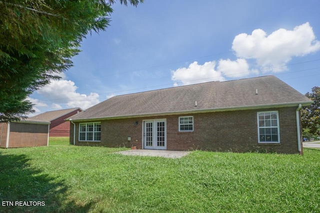 1117 Worthington Blvd, Maryville, TN 37801 - back of house with french doors, brick siding, a lawn, and a shingled roof