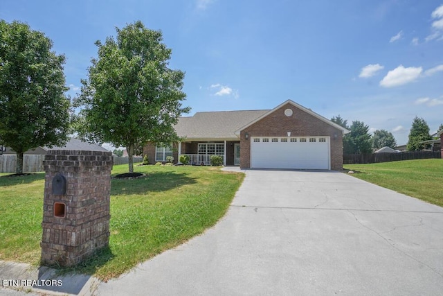 1117 Worthington Blvd, Maryville, TN 37801 - ranch-style home with an attached garage, concrete driveway, and brick siding
