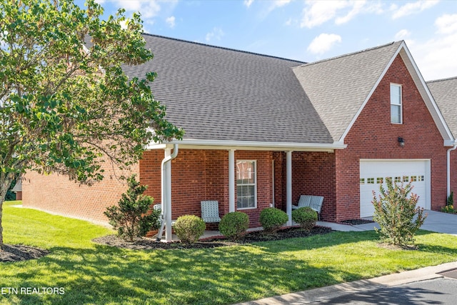 7830 Thomas Henry Way, Knoxville, TN 37938 - view of front of property featuring brick siding, a front lawn, and roof with shingles