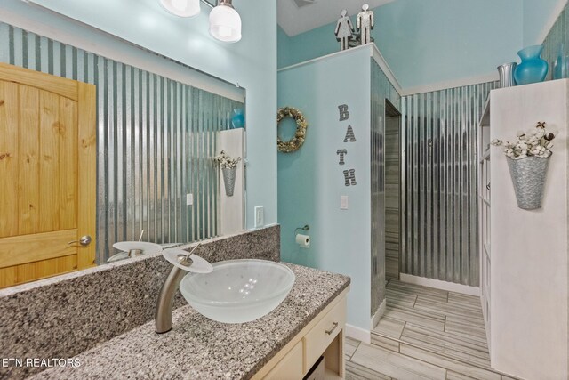 2115 Riverview Dr, Dandridge, TN 37725 - bathroom featuring vanity and baseboards