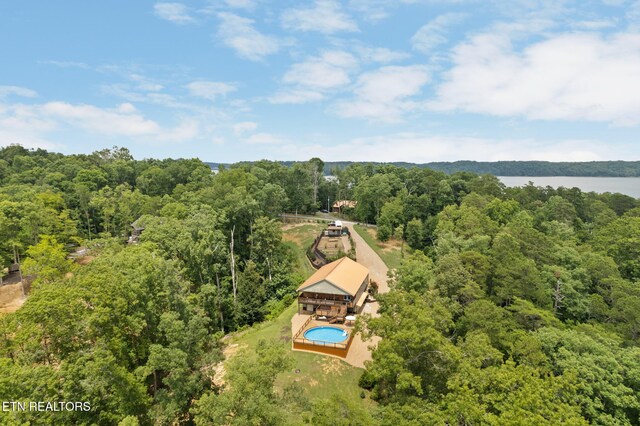 2115 Riverview Dr, Dandridge, TN 37725 - drone / aerial view of a heavily wooded area, a nearby body of water, and a pool