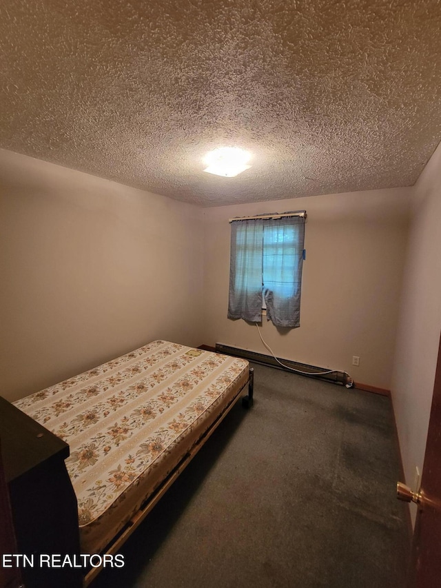 1403 Skyline Dr, New Market, TN 37820 - carpeted bedroom featuring a textured ceiling