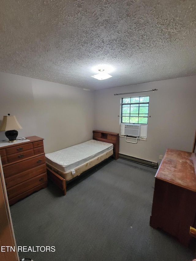 1403 Skyline Dr, New Market, TN 37820 - bedroom with a baseboard heating unit, carpet flooring, a textured ceiling, and cooling unit