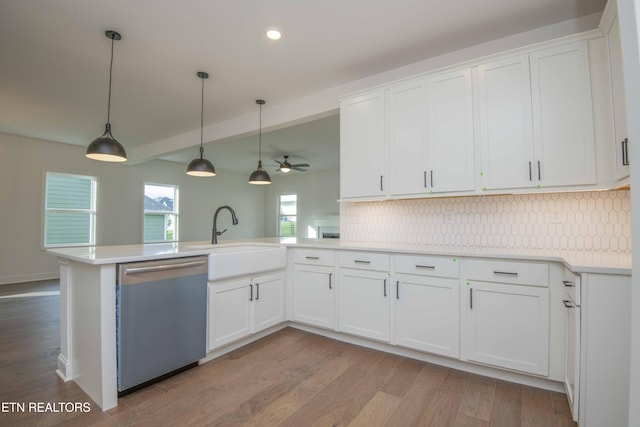 349 Ivey Farms Ln, Farragut, TN 37934 - kitchen featuring dishwasher, decorative backsplash, a peninsula, wood finished floors, and recessed lighting