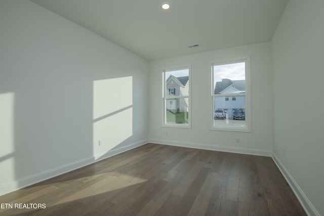 349 Ivey Farms Ln, Farragut, TN 37934 - unfurnished room featuring dark wood-style floors, lofted ceiling, and recessed lighting