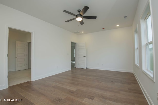 349 Ivey Farms Ln, Farragut, TN 37934 - empty room with a ceiling fan, healthy amount of natural light, wood finished floors, and recessed lighting