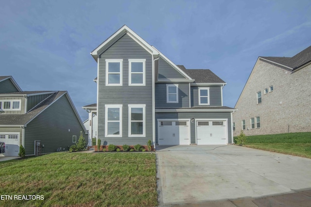 349 Ivey Farms Ln, Farragut, TN 37934 - traditional home featuring a garage, driveway, and a front lawn