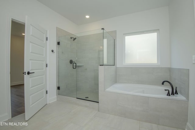 349 Ivey Farms Ln, Farragut, TN 37934 - full bath with a stall shower, a garden tub, tile patterned flooring, and recessed lighting