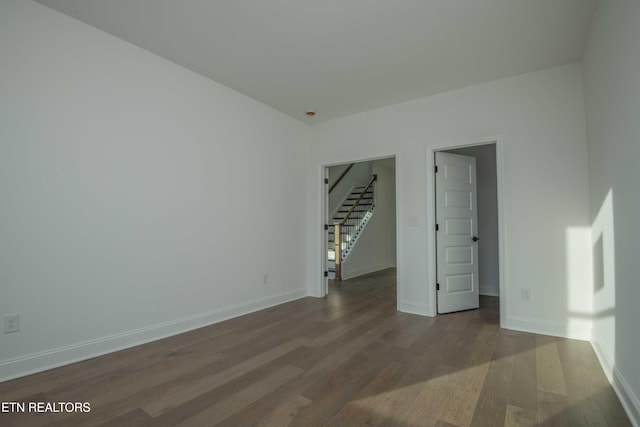 349 Ivey Farms Ln, Farragut, TN 37934 - unfurnished room featuring wood finished floors and stairs