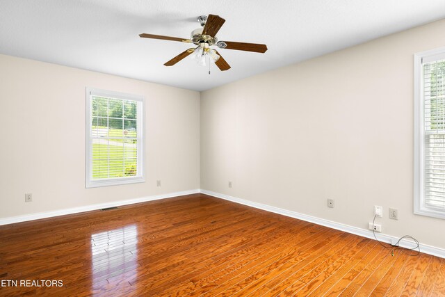 178 Scenic Hill Ln, Lenoir City, TN 37771 - empty room with wood finished floors and baseboards
