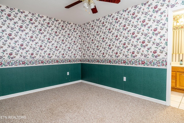 178 Scenic Hill Ln, Lenoir City, TN 37771 - spare room with wallpapered walls, a wainscoted wall, ceiling fan, carpet, and baseboards