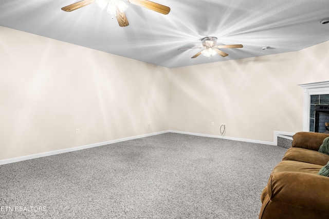 178 Scenic Hill Ln, Lenoir City, TN 37771 - living area with ceiling fan, carpet floors, baseboards, and a tiled fireplace