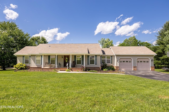 178 Scenic Hill Ln, Lenoir City, TN 37771 - single story home with a garage, asphalt driveway, a porch, and a front yard