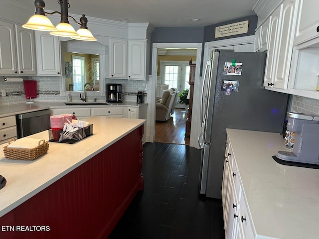 133 Coolidge Rd, Lafollette, TN 37766 - kitchen with a sink, dishwasher, tasteful backsplash, white cabinets, and dark wood finished floors