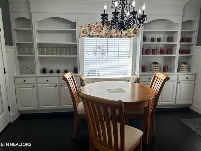 133 Coolidge Rd, Lafollette, TN 37766 - dining area with a chandelier, dark wood-type flooring, and built in shelves