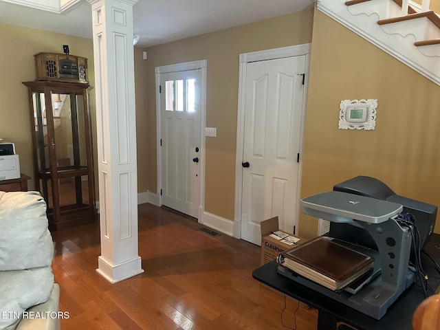 133 Coolidge Rd, Lafollette, TN 37766 - entryway featuring decorative columns, wood finished floors, and baseboards