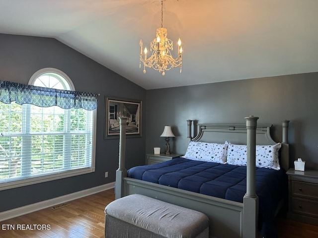 133 Coolidge Rd, Lafollette, TN 37766 - bedroom with wood finished floors, a chandelier, lofted ceiling, and baseboards