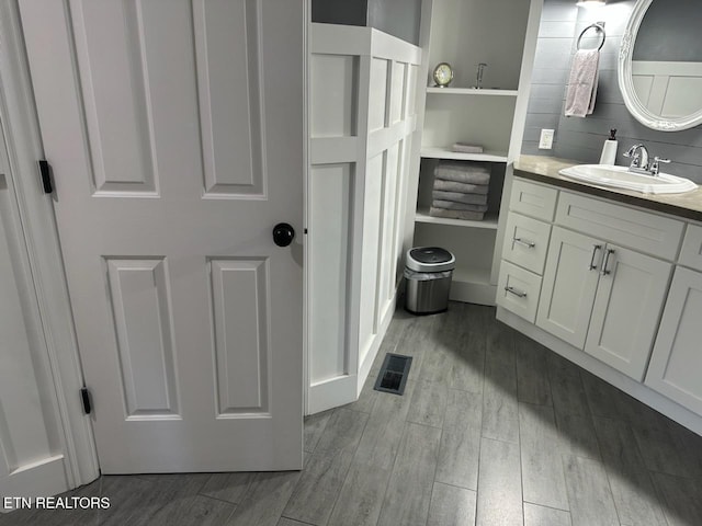 133 Coolidge Rd, Lafollette, TN 37766 - bathroom with vanity and wood finished floors