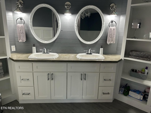 133 Coolidge Rd, Lafollette, TN 37766 - bathroom with double vanity and wood finished floors