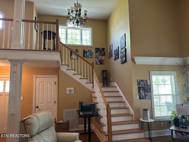 133 Coolidge Rd, Lafollette, TN 37766 - stairs featuring a chandelier and baseboards