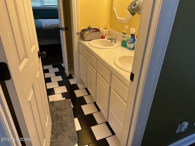 133 Coolidge Rd, Lafollette, TN 37766 - ensuite bathroom with double vanity and tile patterned floors