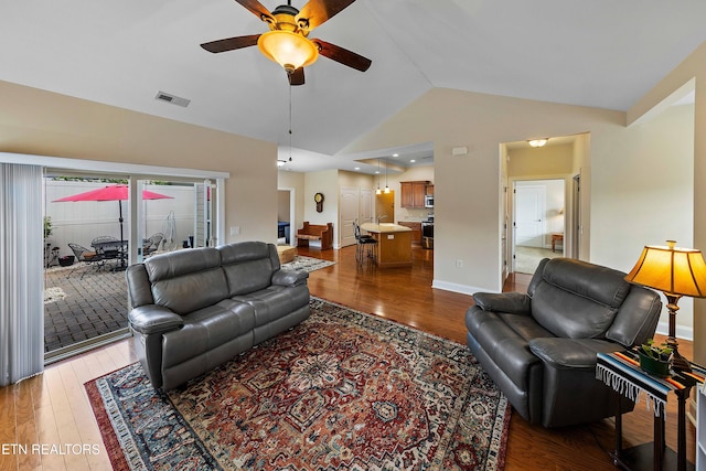 4921 Willow Bluff Cir, Knoxville, TN 37914 - living room with a ceiling fan, hardwood / wood-style flooring, vaulted ceiling, and baseboards