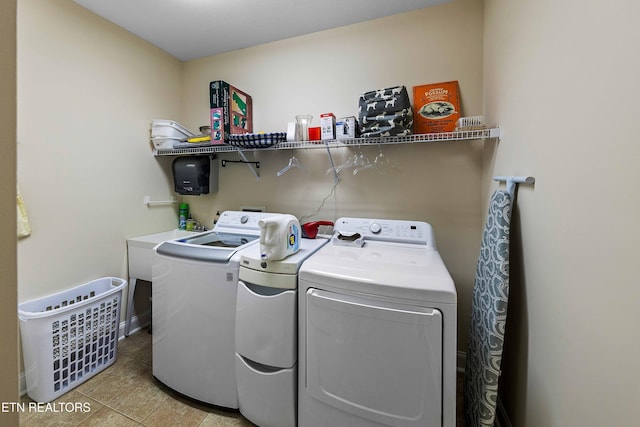 4921 Willow Bluff Cir, Knoxville, TN 37914 - laundry room featuring independent washer and dryer and light tile patterned floors