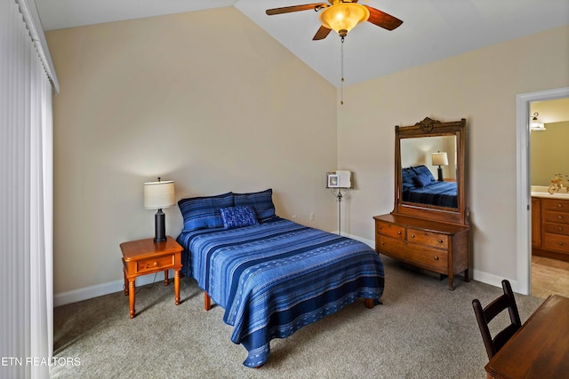 4921 Willow Bluff Cir, Knoxville, TN 37914 - bedroom with vaulted ceiling, light carpet, connected bathroom, baseboards, and a ceiling fan
