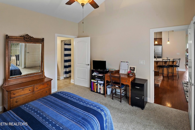 4921 Willow Bluff Cir, Knoxville, TN 37914 - bedroom featuring stainless steel fridge, baseboards, high vaulted ceiling, an office area, and carpet floors