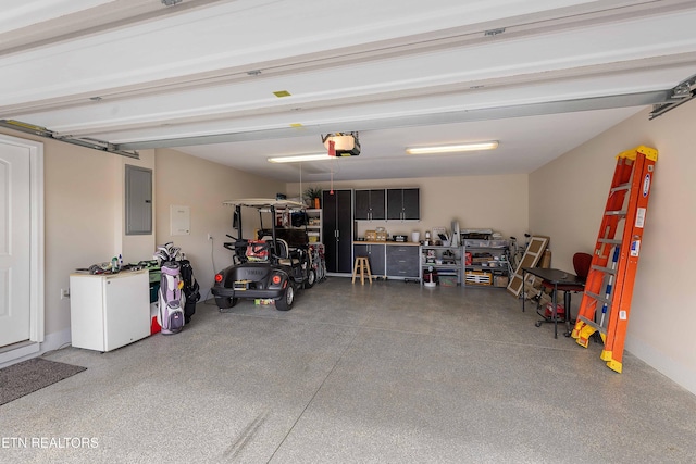 4921 Willow Bluff Cir, Knoxville, TN 37914 - garage with electric panel and a garage door opener