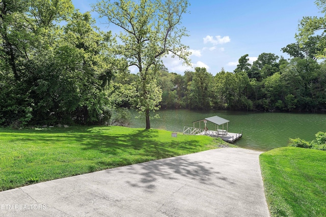 4921 Willow Bluff Cir, Knoxville, TN 37914 - dock with a water view, a lawn, and a view of trees