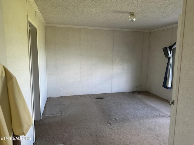 3101 Watson Rd, Loudon, TN 37774 - unfurnished room featuring carpet floors, a textured ceiling, and crown molding