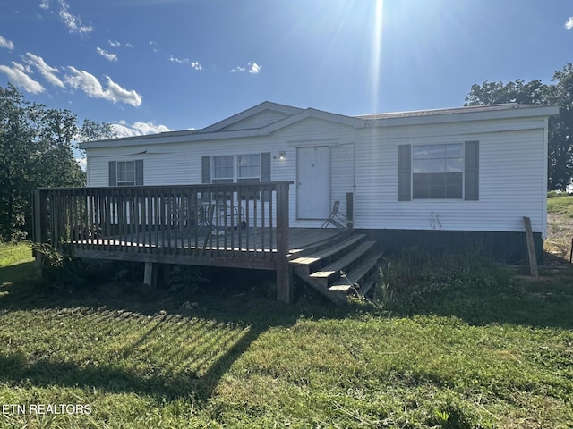 3101 Watson Rd, Loudon, TN 37774 - view of front of home with a front lawn and a deck
