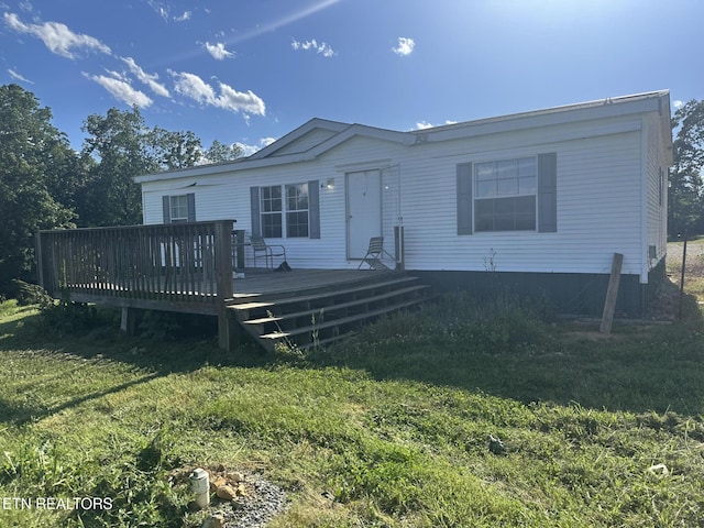 3101 Watson Rd, Loudon, TN 37774 - manufactured / mobile home with a deck and a front yard