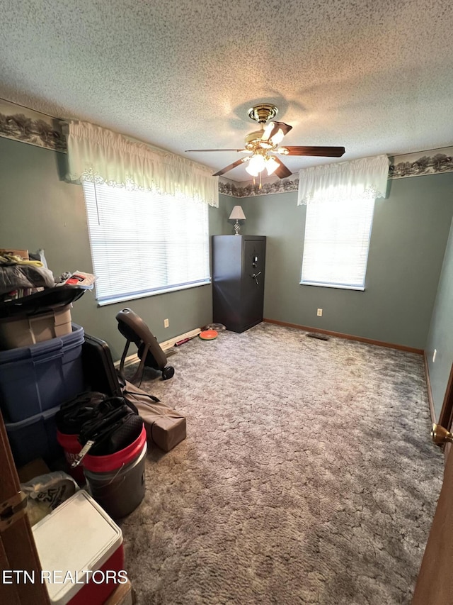 243 Choctaw Ln, Niota, TN 37826 - bedroom featuring carpet, a textured ceiling, a ceiling fan, and baseboards
