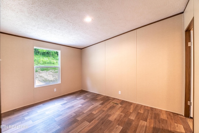1587 Sweetwater Rd, Philadelphia, TN 37846 - unfurnished room featuring crown molding, wood finished floors, a textured ceiling, and recessed lighting