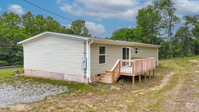 1587 Sweetwater Rd, Philadelphia, TN 37846 - rear view of property with a wooden deck and crawl space